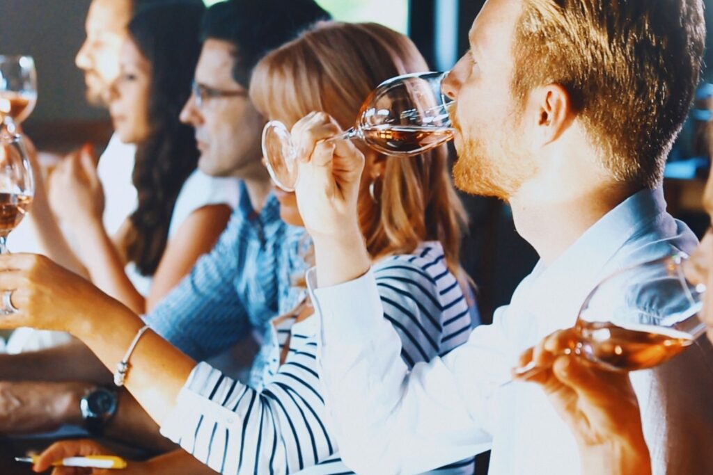 Corporate incentive group enjoying a wine tasting experience in Cape Town’s scenic Winelands