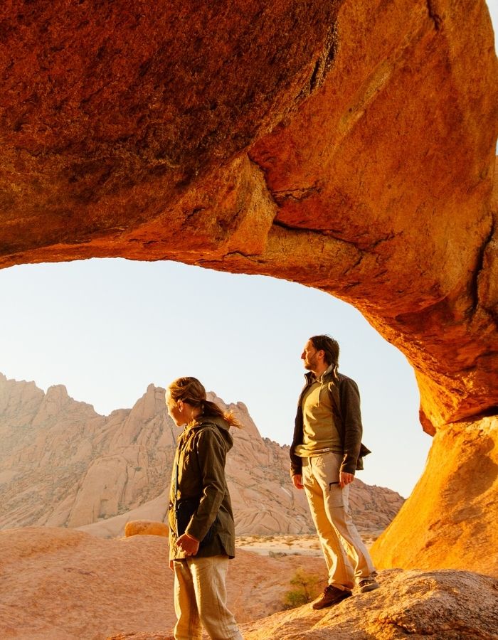 Stunning Namib Desert dunes and wildlife under clear skies, showcasing Namibia’s breathtaking landscapes