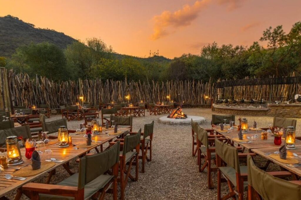 Evening bonfire at African safari lodge creating unforgettable memories